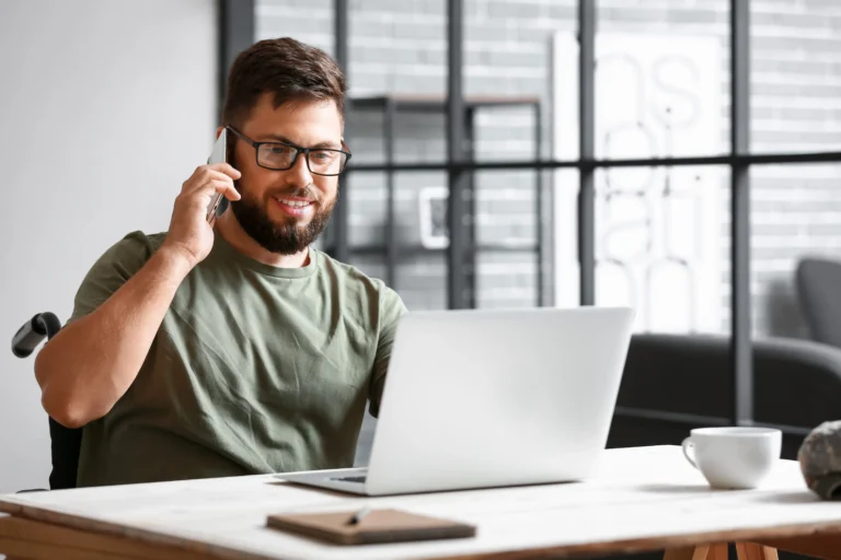 disabled Veteran in a wheelchair on the phone getting a free consultation with REE Medical