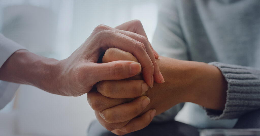 Veteran receives compassionate support during medical discussion or evaluation.