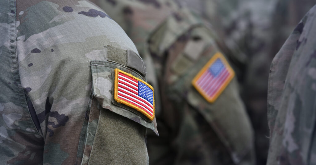 US armed forces service members in uniform.