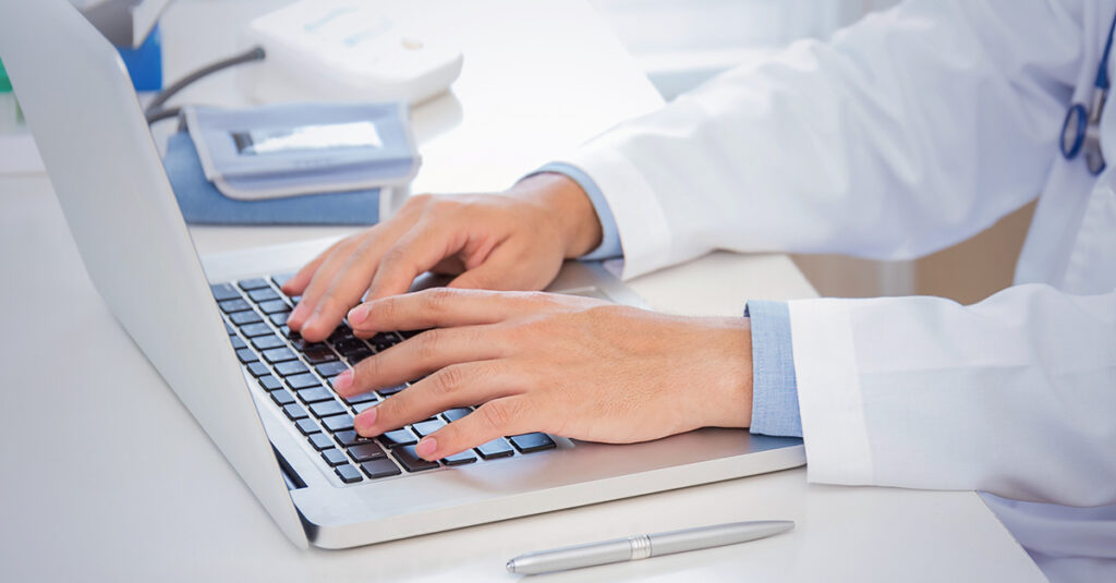 Doctor preparing independent medical documentation for review.