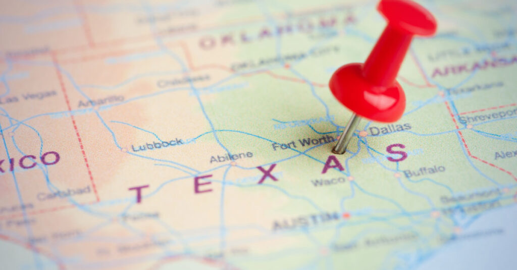 Pushpin in a map of the united states.