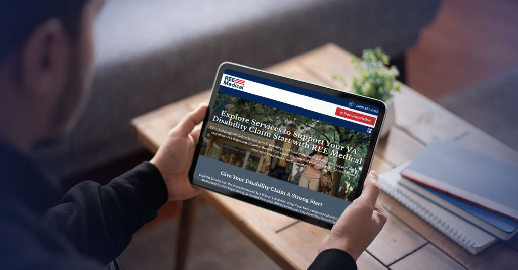 Veteran looking at the REE Medical website on a tablet.