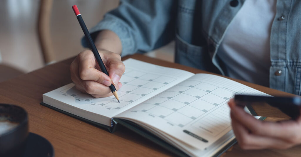 Veteran looking at calendar.