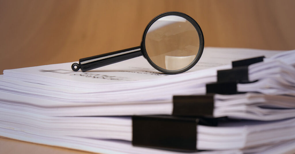 Magnifying glass to search.