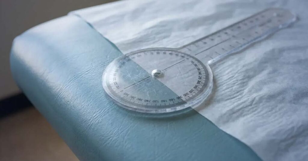 Goniometer tool used for measuring neck range of motion.