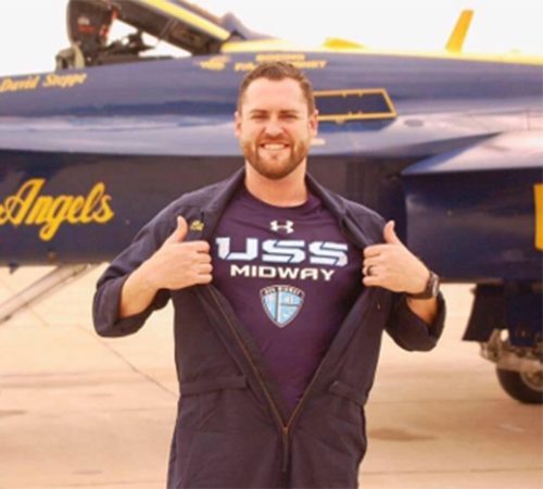 Nick Todd standing in front of a jet.
